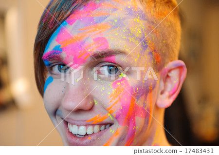 Young man preparing for photosession with bodyart painting 17483431