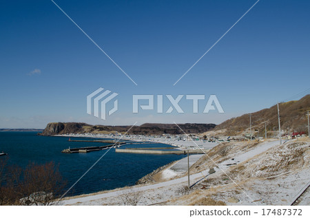 White snow and blue sea 17487372