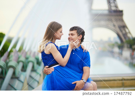 Beautiful young dating couple in Paris 17487792