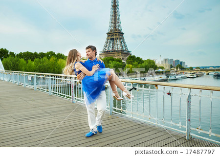 Beautiful young dating couple in Paris 17487797
