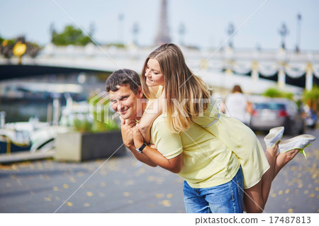 Beautiful young dating couple in Paris Beautiful young dating couple in Paris 17487813