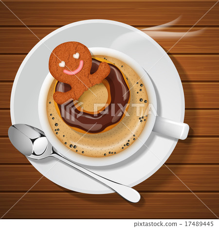 ginger bread with doughnut in cup of hot coffee ginger bread with doughnut in cup of hot coffee 17489445