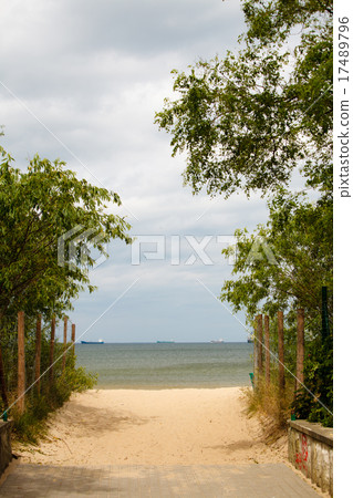 Summer vacation. Entrance to a sandy beach. Seascape. Summer vacation. Entrance to a sandy beach. Seascape. 17489796