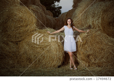 Romantic young woman posing outdoor. 17494672