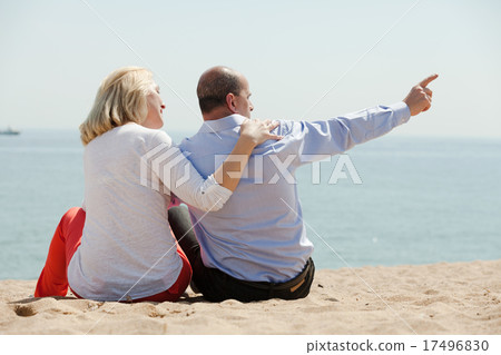 mature couple at sea beach mature couple at sea beach 17496830