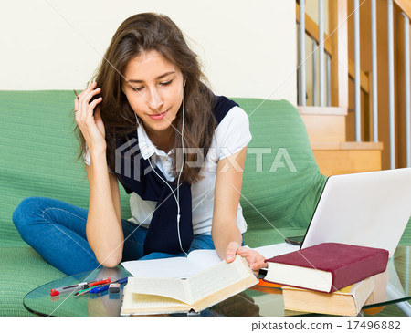 girl using laptop at home girl using laptop at home 17496882