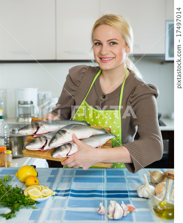 Woman with fish 17497014