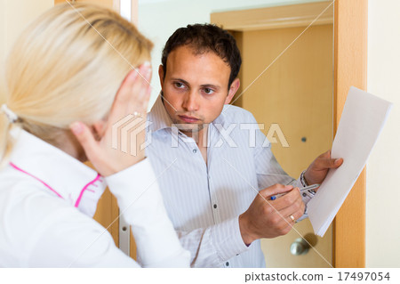 Collector getting the arrears from woman 17497054