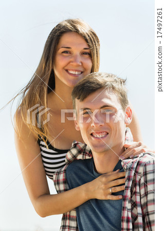 Smiling young female running outdoor Smiling young female running outdoor 17497261