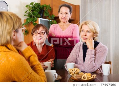 sad senior female friends 17497360
