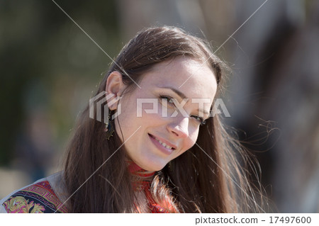 portrait of woman in park 17497600