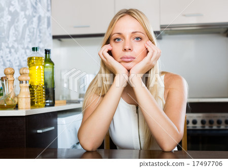 sad blonde woman 17497706