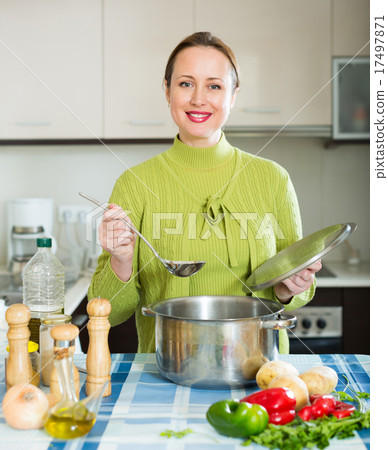 woman cooking soup 17497871