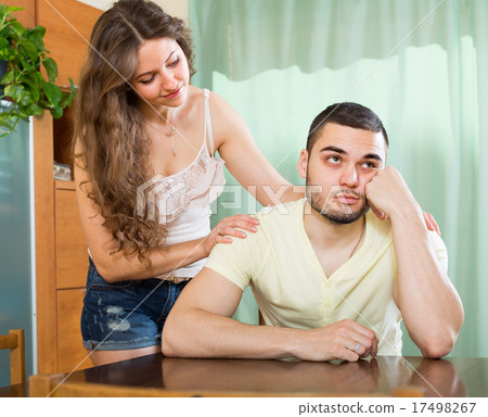 Loving woman consoling the depressed man 17498267