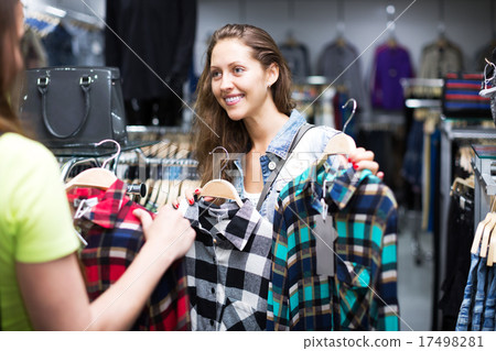woman buying shirt 17498281