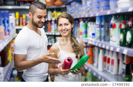 People buying detergents in the shopping mall People buying detergents in the shopping mall 17498392