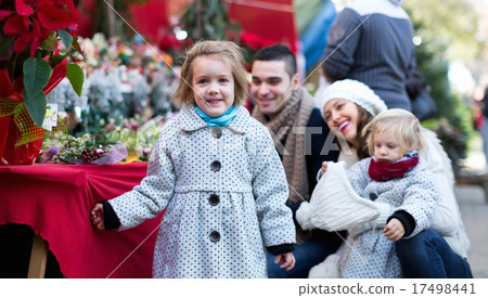 Family of four at Christmas market 17498441