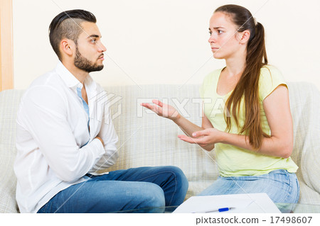 couple with documents in apartment couple with documents in apartment 17498607