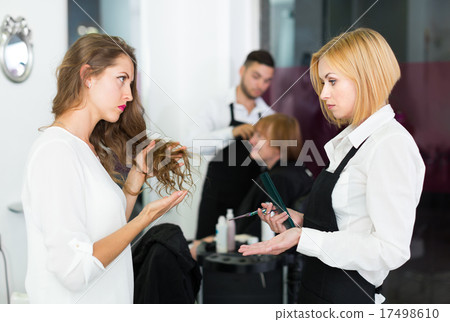 Adults person dispute about haircut Adults person dispute about haircut 17498610