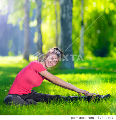 Stretching woman in outdoor sport exercise. 17499505