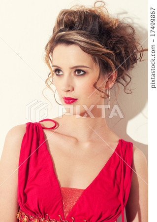 Close-up of beautiful girl with red vogue maekeup 17499867