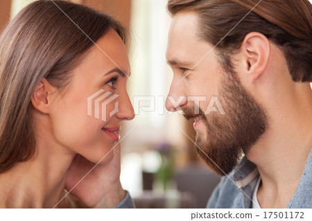 Cheerful man and woman are spending time together 17501172