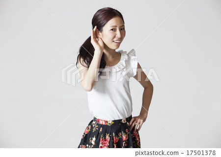 Female finger pointing pose - Stock Photo [17501378] - PIXTA