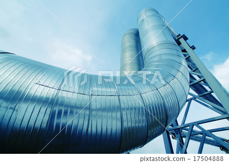 IndustrialSteel pipelines valves against blue sky 17504888