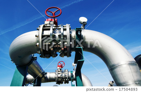 IndustrialSteel pipelines valves against blue sky 17504893