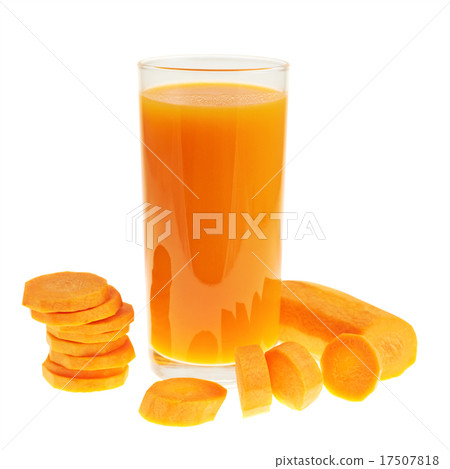 Sliced carrot pieces next to a juice bottle 17507818