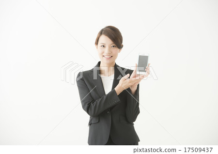 Women with mobile phones (20's suit) 17509437