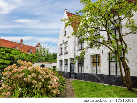 Bruges historical pitched roofs of Begijnhof  17510391