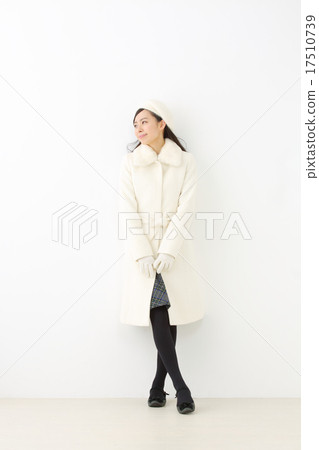 A young woman in a coat 17510739