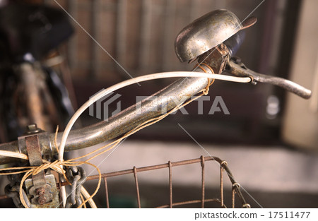 Old-fashioned vintage bike handlebar and bell 17511477