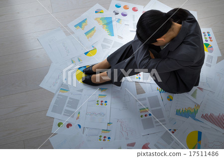 Female exhaustion depletion black company tired and depressed a lot of materials engineer OL office lady holding a knee 17511486