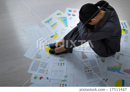 Female exhaustion depletion black company tired and depressed a lot of materials engineer OL office lady holding a knee 17511487