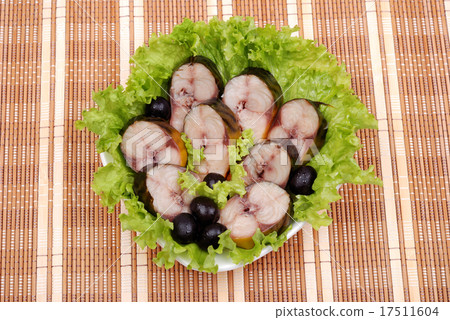 Composition from a smoked mackerel on a plate 17511604