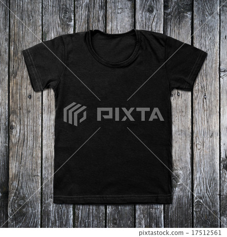 Black blank t-shirt on wooden background Black blank t-shirt on wooden background 17512561