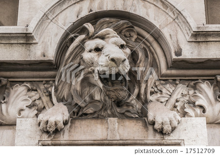 Lion head relief on the facade Lion head relief on the facade 17512709