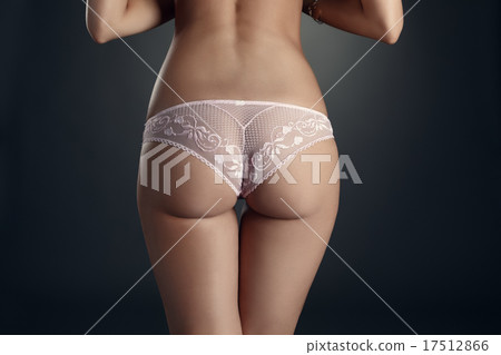 Close-up of elastic woman's ass in lace panties 17512866
