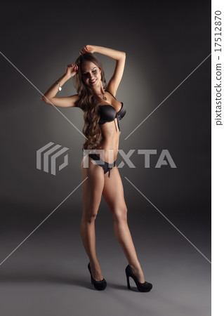 Model with perfect body advertises erotic lingerie 17512870