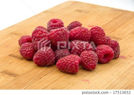 Ripe sweet raspberries on wood table close-up Ripe sweet raspberries on wood table close-up 17513652