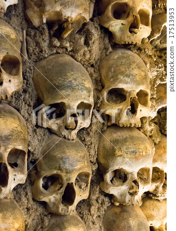 Wall full of skulls and bones 17513953