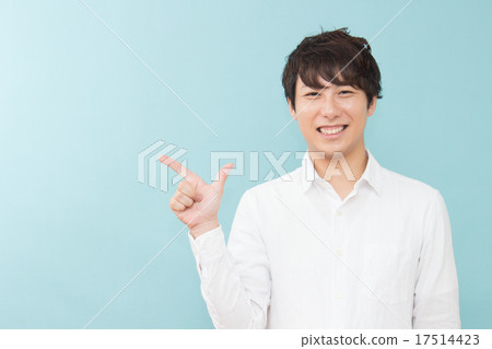 Male smile finger pointing 17514423