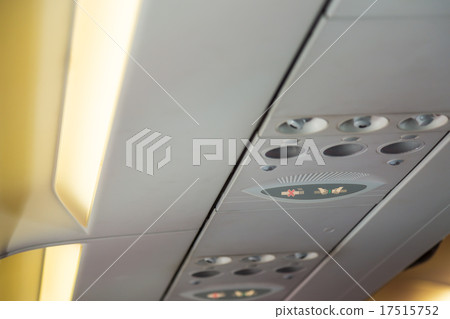 No smoking sign and seat belt sign on the airplane 17515752
