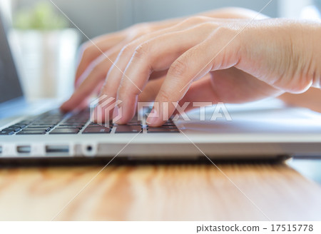 Closeup of business woman hand typing on laptop keyboard Closeup of business woman hand typing on laptop keyboard 17515778