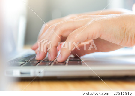 Closeup of business woman hand typing on laptop keyboard Closeup of business woman hand typing on laptop keyboard 17515810