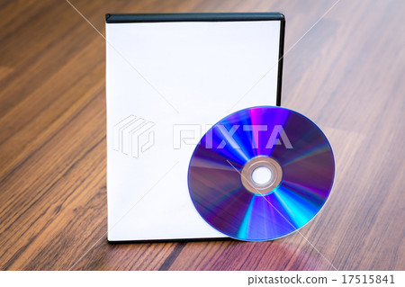 Blank compact disc with cover on wood background ground Blank compact disc with cover on wood background ground 17515841