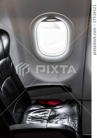 Airplane window ( Filtered image processed vintage effect. ) Airplane window ( Filtered image processed vintage effect. ) 17516121