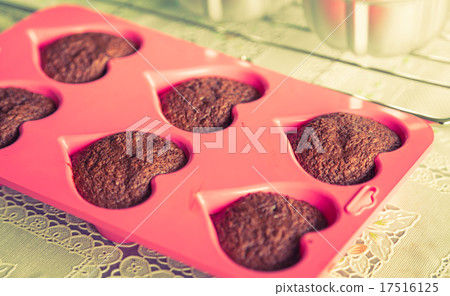 Chocolate muffins on table ( Filtered image processed vintage ef 17516125